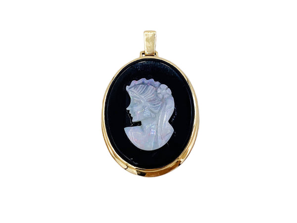 Front view of vintage carved opal and onyx cameo pendant