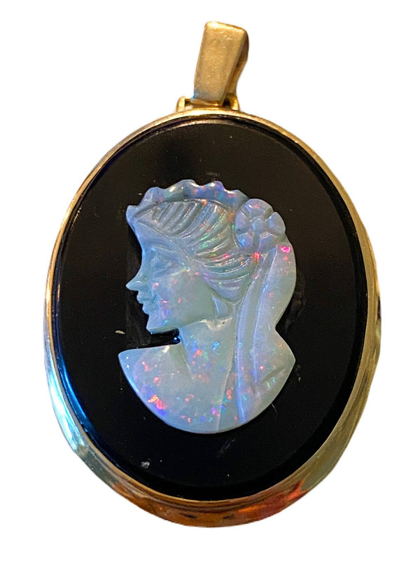 Close-up of pendant and opal cameo colorplay