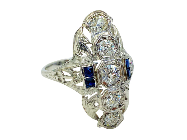 Side view of antique diamond and sapphire shield ring