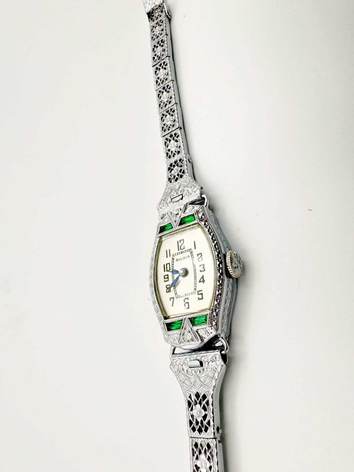 1928 Bulova Art Deco ladies watch in 14K white gold with diamonds and emeralds