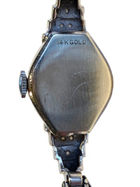 Solid 14K white gold Benrus caseback with smooth finish, pre-war design.