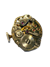 Swiss 21 jewel Benrus mechanical movement marked AXZ import code, circa 1938–1940.