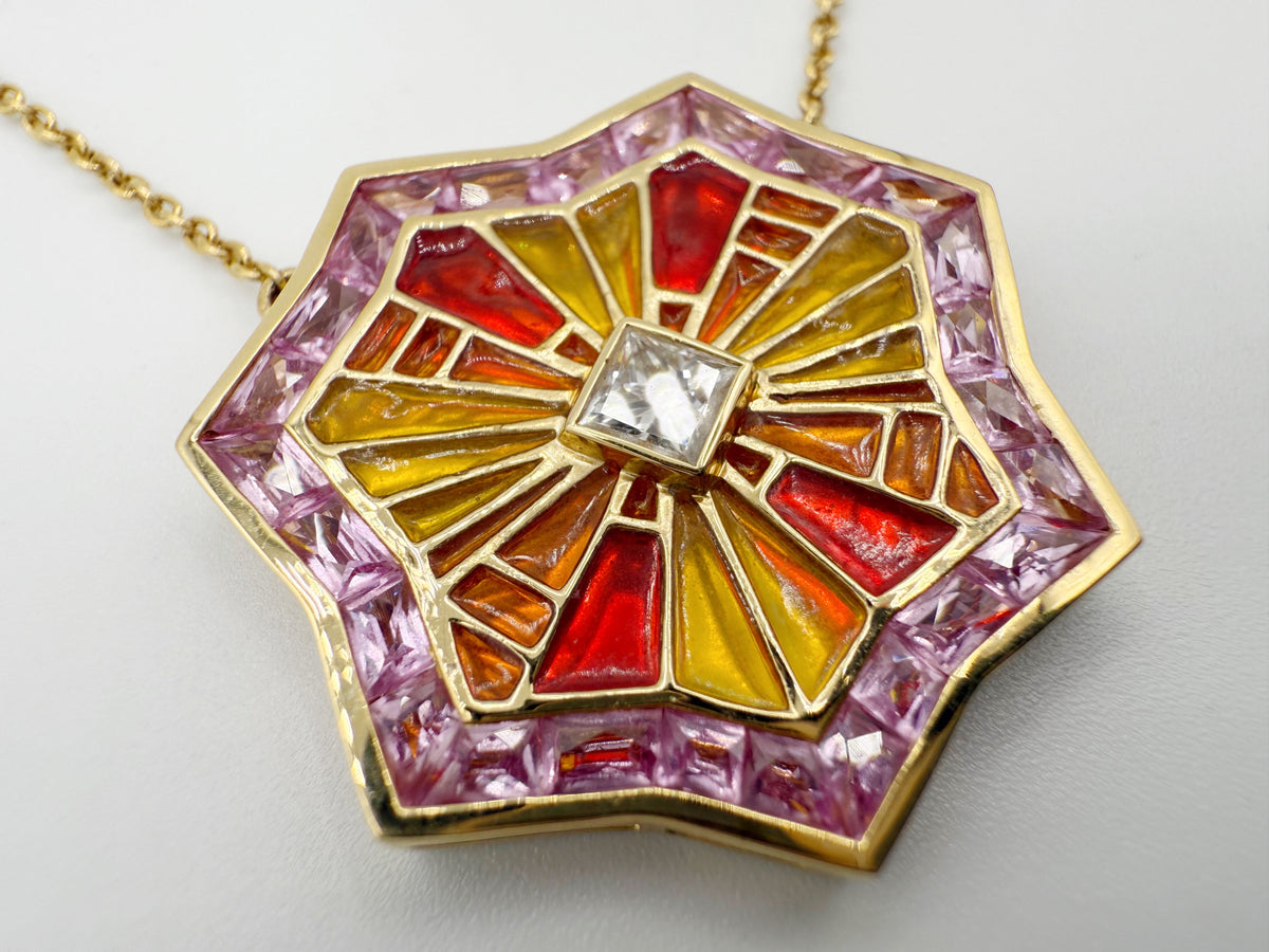 Detail of calibré-cut pink sapphire halo and square diamond accent on ARK necklace