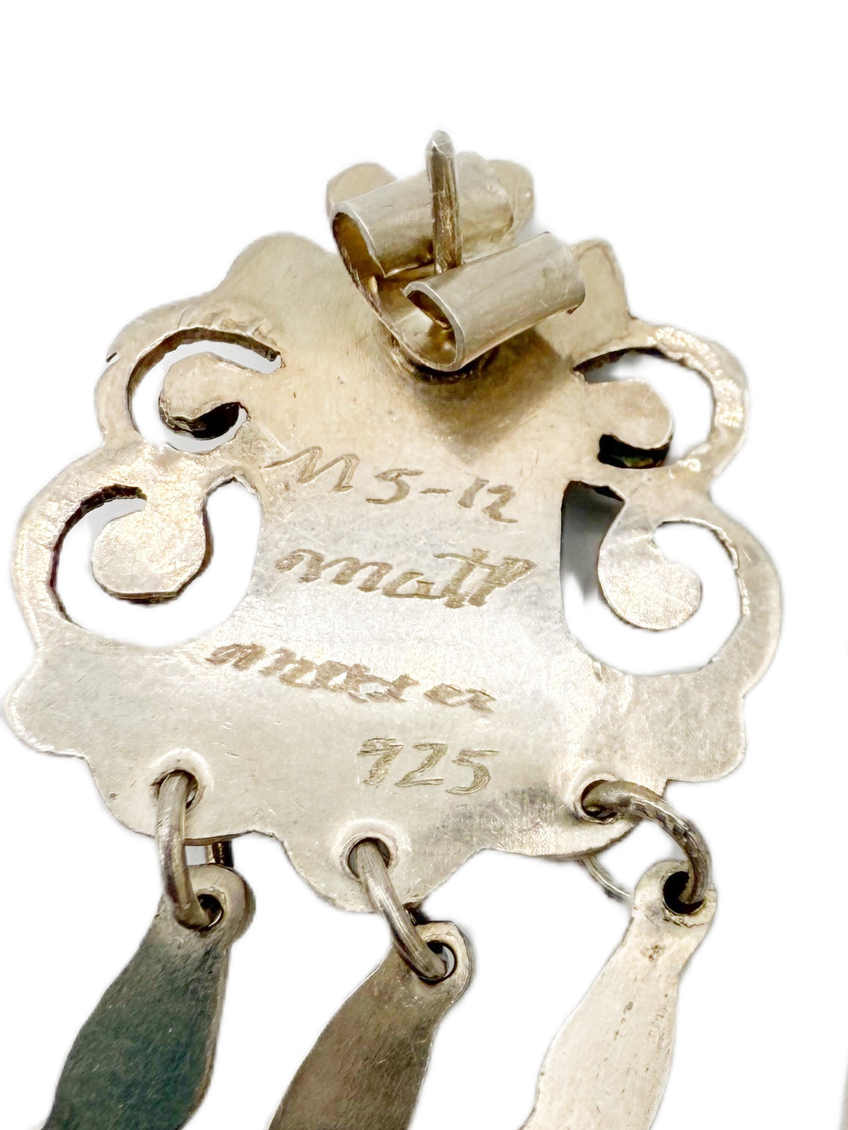 Back of Matl earrings showing engraved marks and MS-12 hallmark