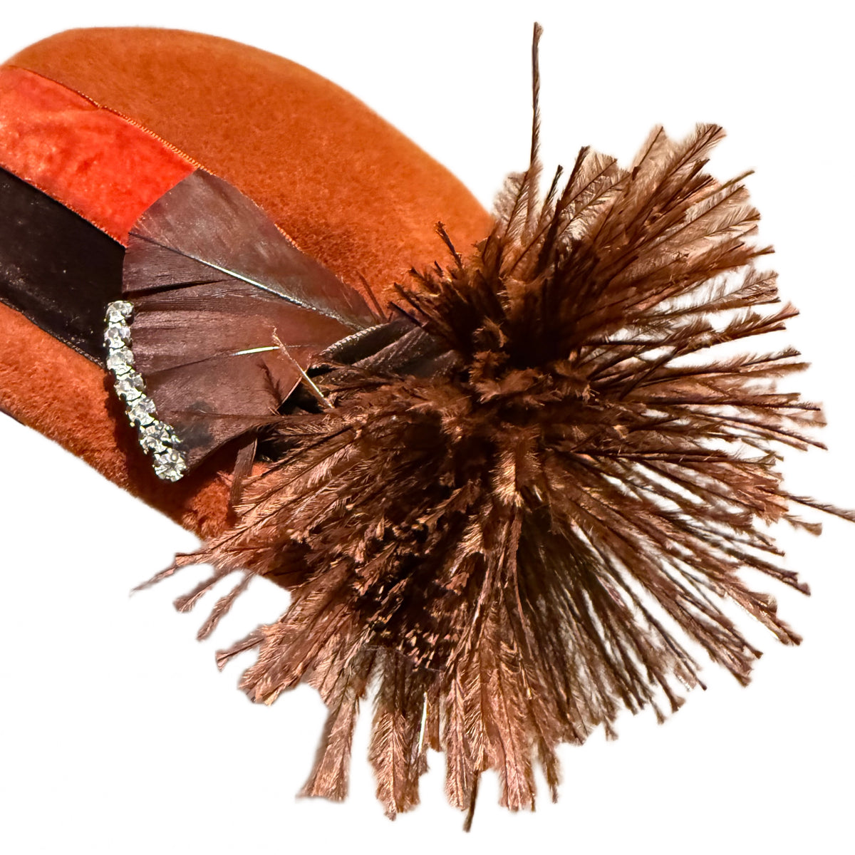 Close-up of Schiaparelli Paris hat feathers and rhinestone detail
