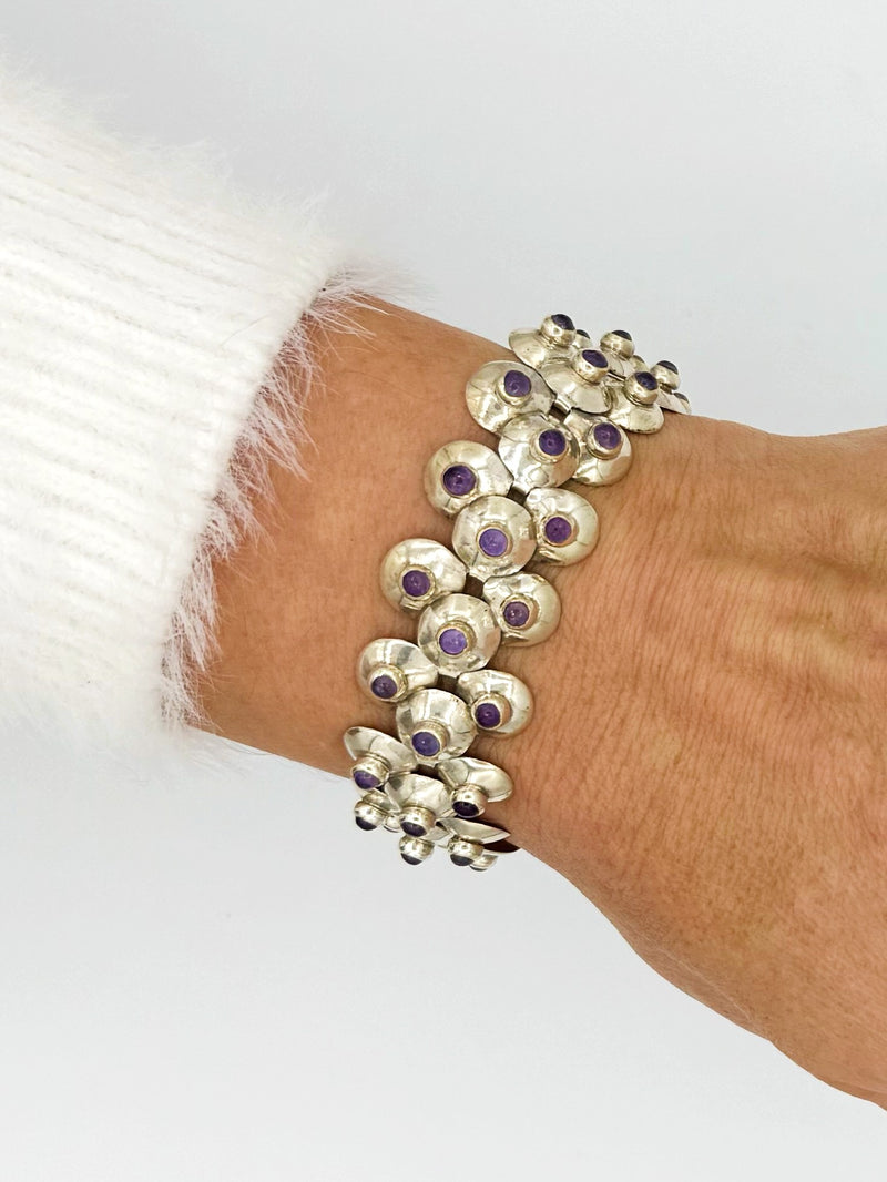 Fred Davis silver and amethyst bracelet worn on wrist