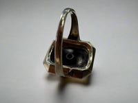 Back of white gold and onyx ring
