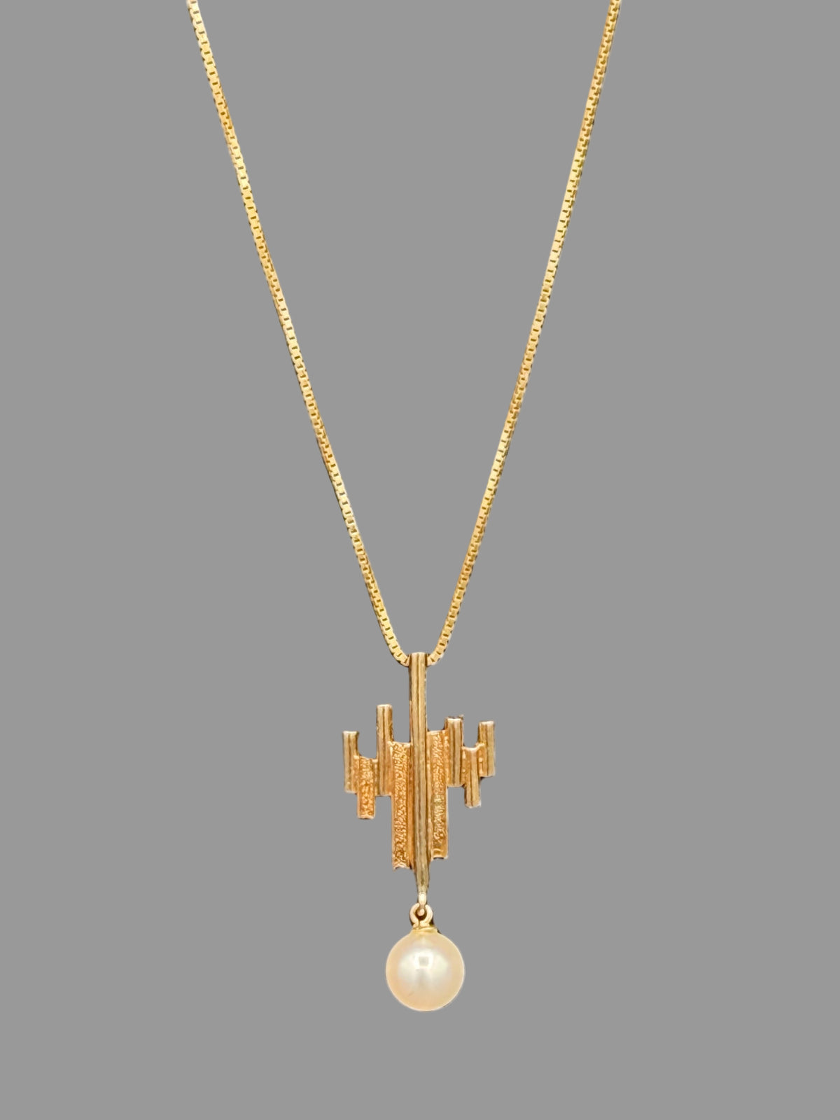 Vintage midcentury 14K gold modernist pendant necklace with pearl drop on Italian box chain.