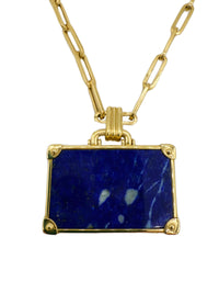 Back view of NeverNot 14K gold suitcase pendant on paperclip-style chain