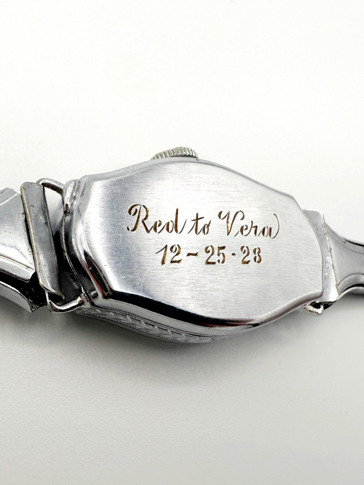 Caseback engraving ‘Red to Vera 12-25-28’ on 1928 Bulova Art Deco watch