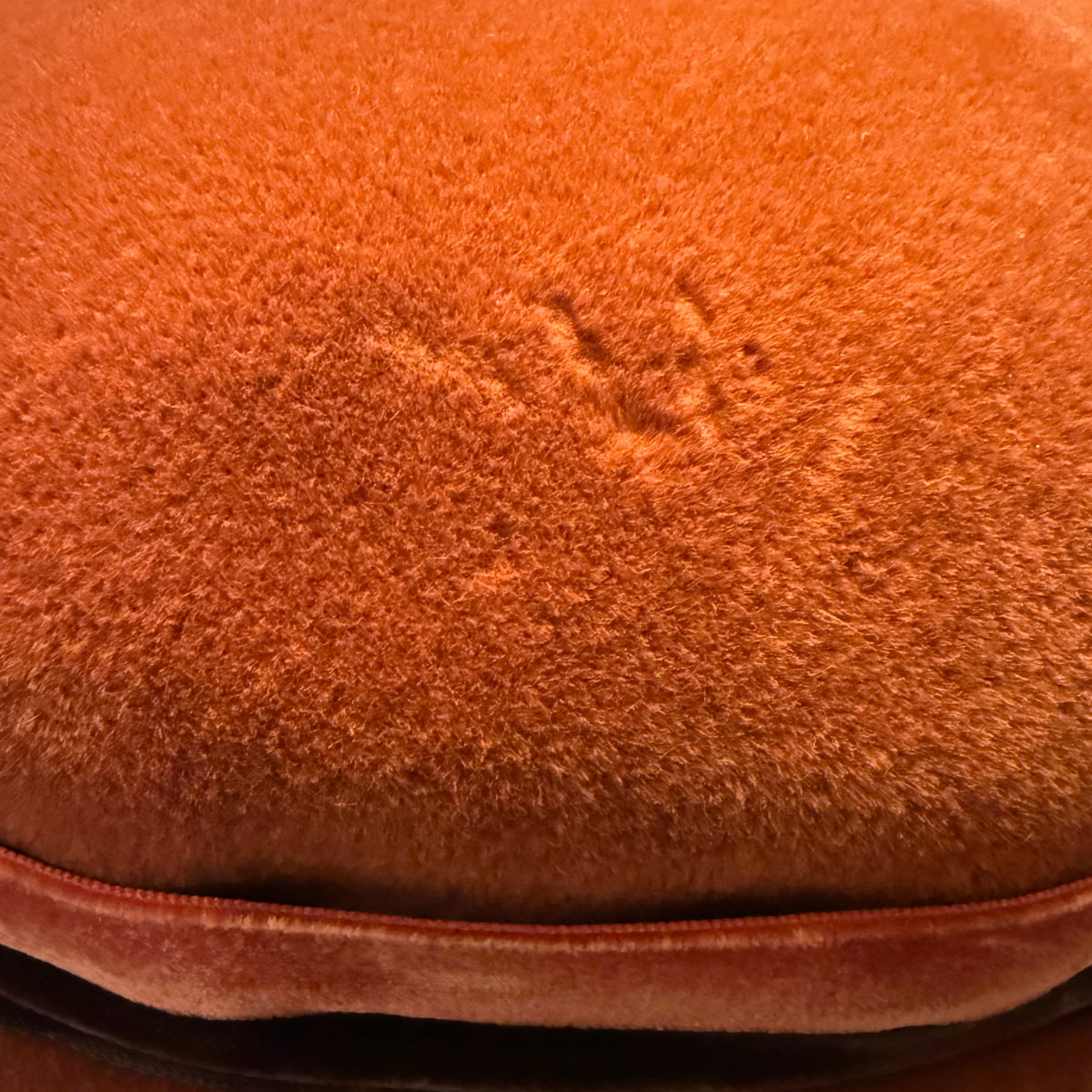 Velour crown showing small areas of surface nap loss consistent with age.