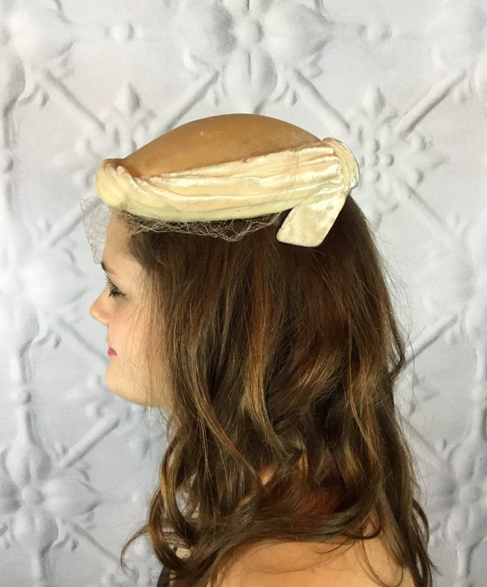 side view of 1940s hat with netting